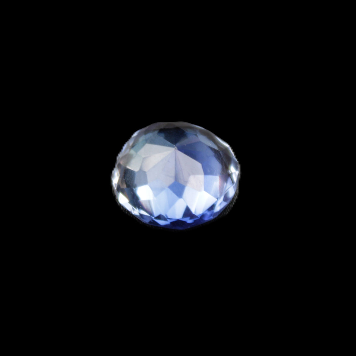 Blue Tanzanite round cut gemstone 11*8mm 7.95ct 1.8g in sunlight - Rocks and Things Store