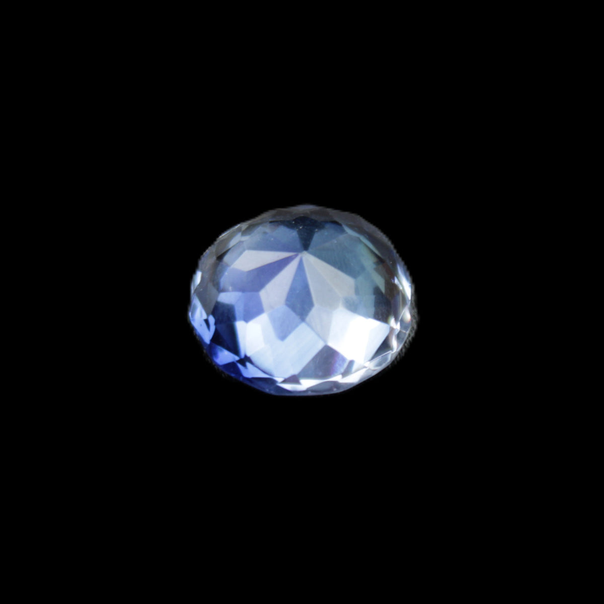 Blue Tanzanite round cut gemstone 11*8mm 7.95ct 1.8g in sunlight - Rocks and Things Store