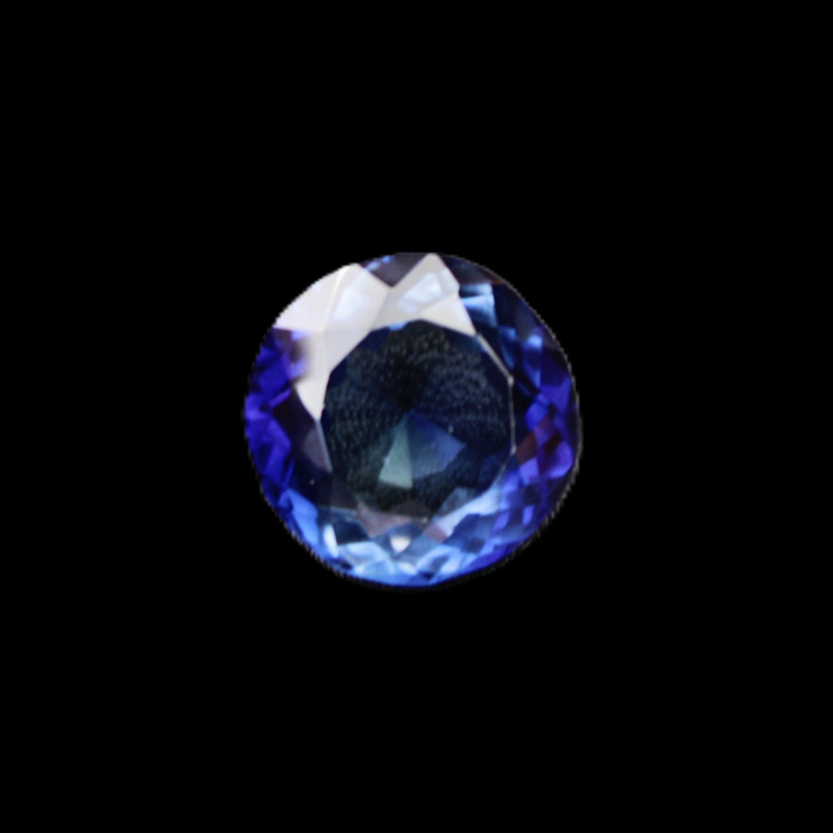 Blue Tanzanite round cut gemstone 11*8mm 7.95ct 1.8g in sunlight - Rocks and Things Store