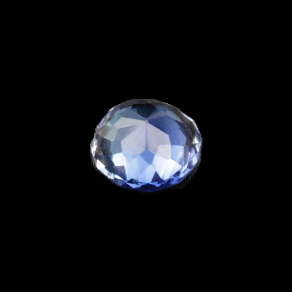 Blue Tanzanite round cut gemstone 11*8mm 7.95ct 1.8g in sunlight - Rocks and Things Store