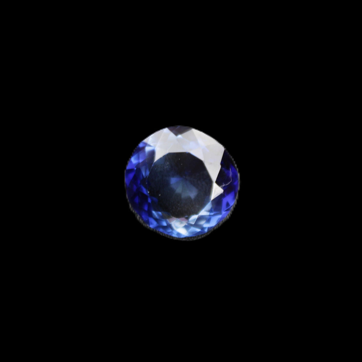 Blue Tanzanite round cut gemstone 11*8mm 7.95ct 1.8g in sunlight - Rocks and Things Store