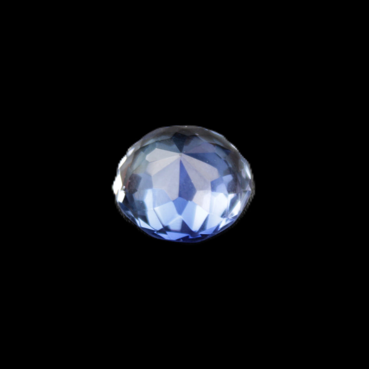 Blue Tanzanite round cut gemstone 11*8mm 7.95ct 1.8g in sunlight - Rocks and Things Store