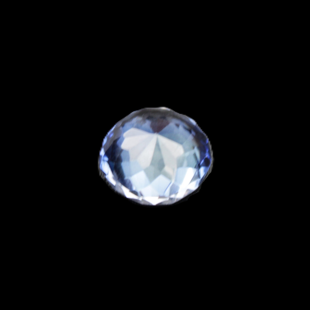 Blue Tanzanite round cut gemstone 11*8mm 7.95ct 1.8g in sunlight - Rocks and Things Store