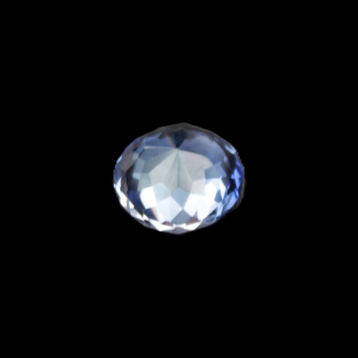 Blue Tanzanite round cut gemstone 11*8mm 7.95ct 1.8g in sunlight - Rocks and Things Store