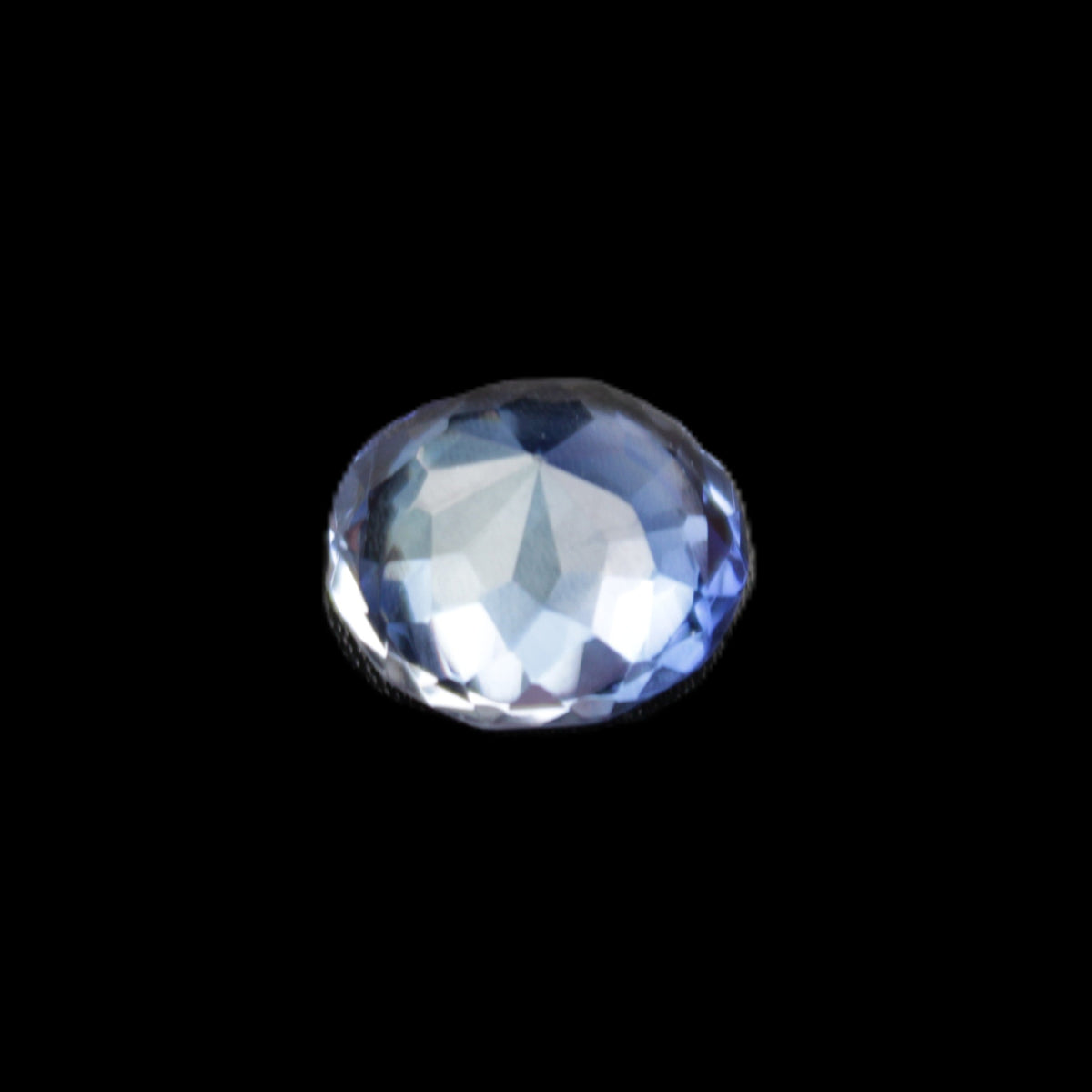 Blue Tanzanite round cut gemstone 11*8mm 7.95ct 1.8g in sunlight - Rocks and Things Store