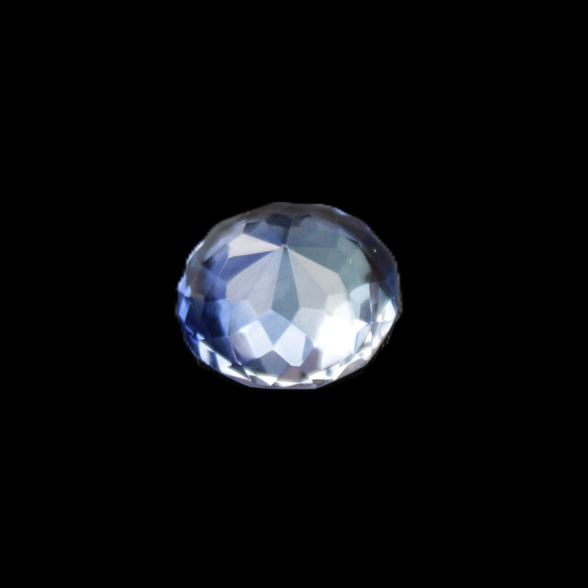 Blue Tanzanite round cut gemstone 11*8mm 7.95ct 1.8g in sunlight - Rocks and Things Store
