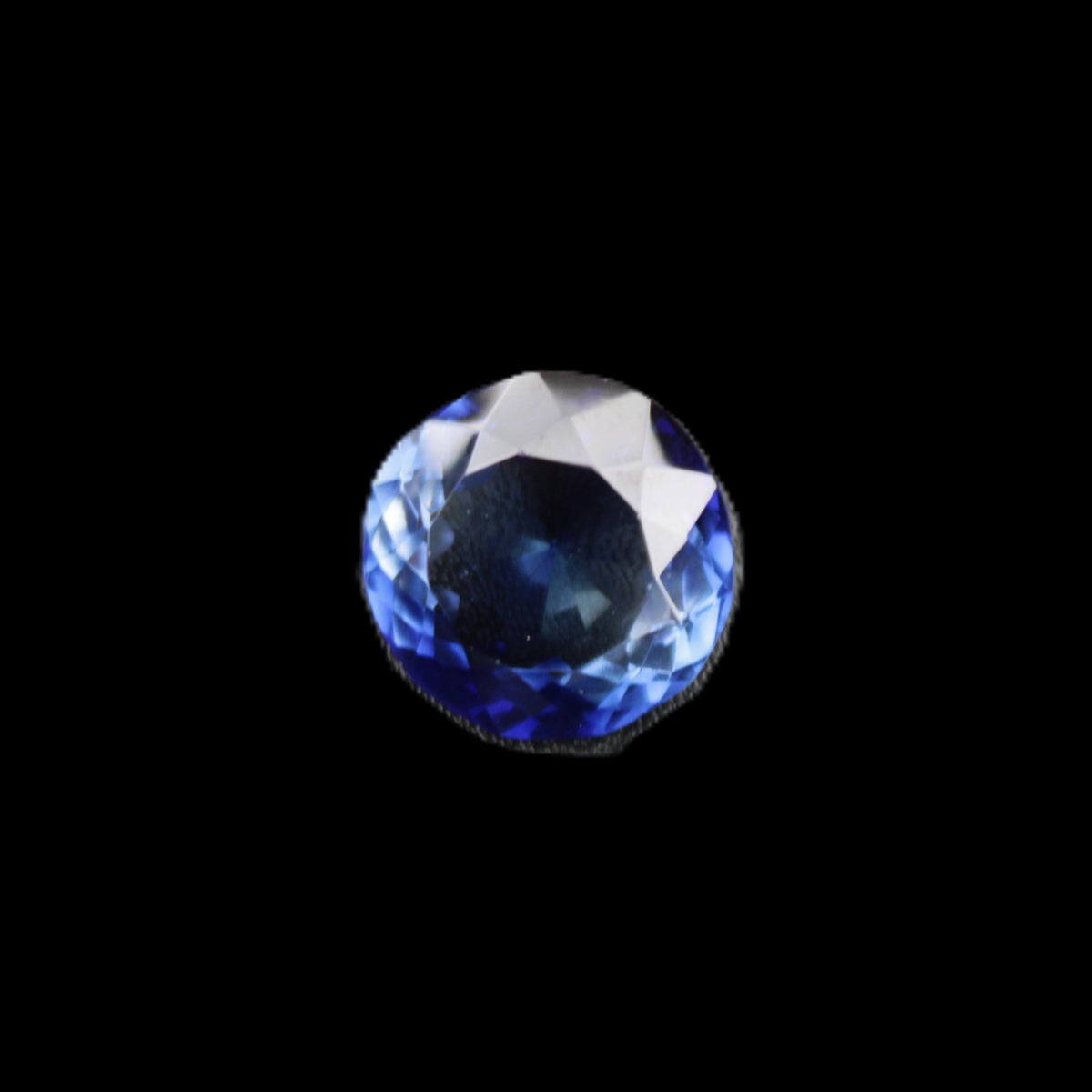 Blue Tanzanite round cut gemstone 11*8mm 7.95ct 1.8g in sunlight - Rocks and Things Store