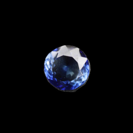 Blue Tanzanite round cut gemstone 11*8mm 7.95ct 1.8g in sunlight - Rocks and Things Store