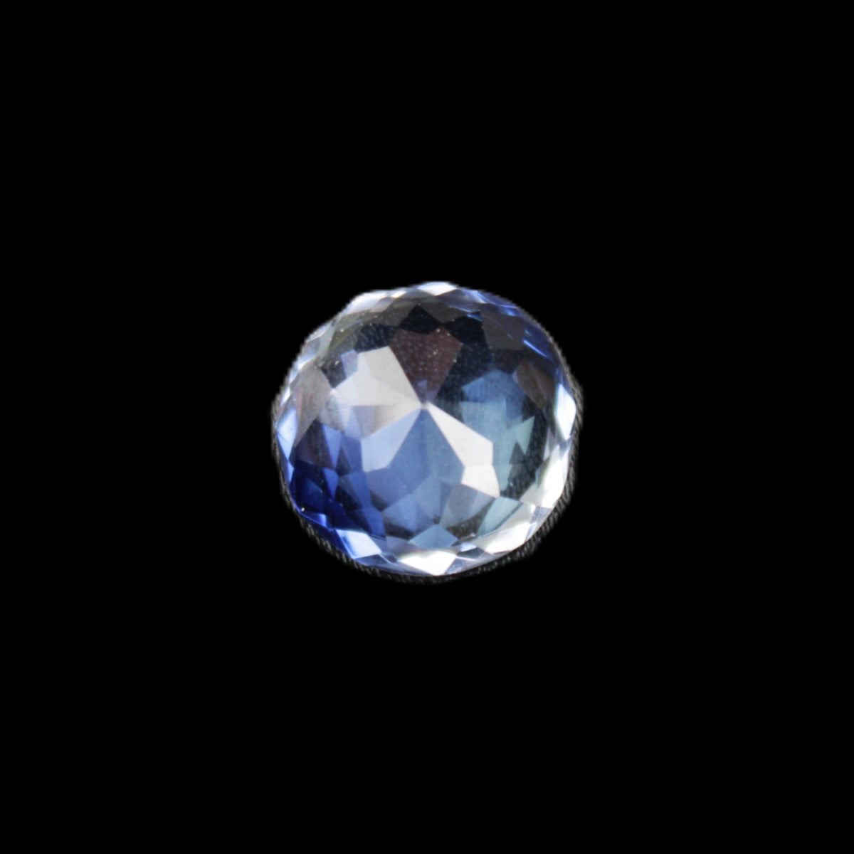 Blue Tanzanite round cut gemstone 11*8mm 7.95ct 1.8g in sunlight - Rocks and Things Store
