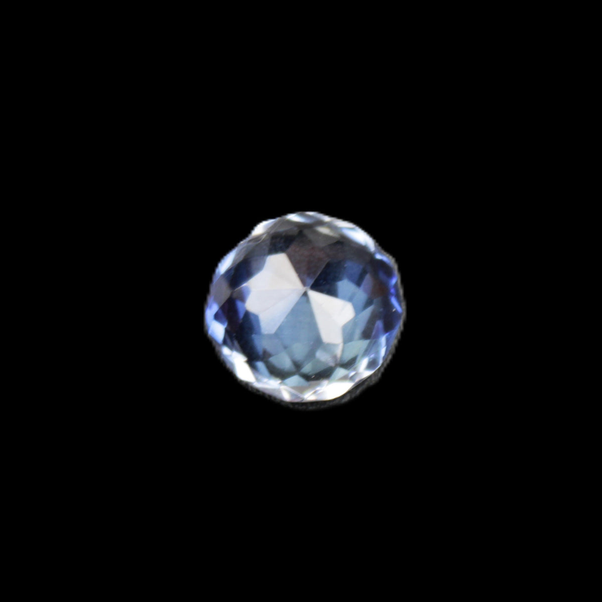 Blue Tanzanite round cut gemstone 11*8mm 7.95ct 1.8g in sunlight - Rocks and Things Store