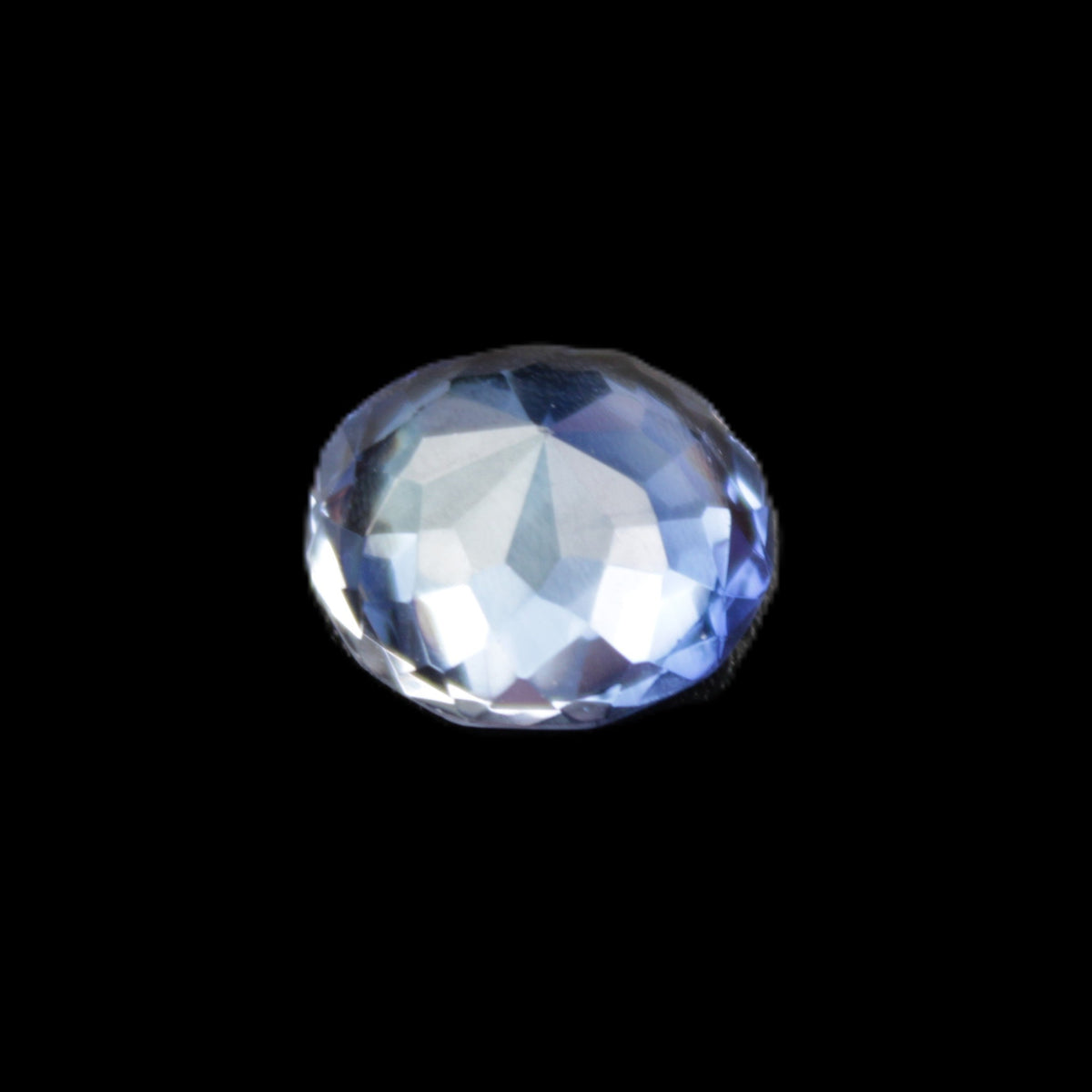 Blue Tanzanite round cut gemstone 11*8mm 7.95ct 1.8g in sunlight - Rocks and Things Store