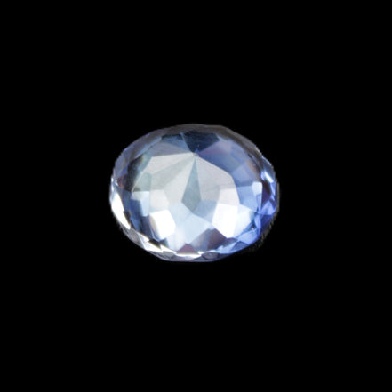 Blue Tanzanite round cut gemstone 11*8mm 7.95ct 1.8g in sunlight - Rocks and Things Store