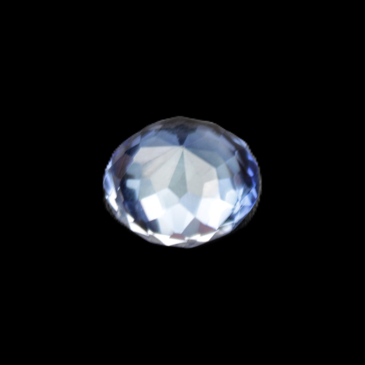 Blue Tanzanite round cut gemstone 11*8mm 7.95ct 1.8g in sunlight - Rocks and Things Store