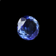 Blue Tanzanite round cut gemstone 11*8mm 7.95ct 1.8g in sunlight - Rocks and Things Store