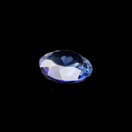 Blue Tanzanite round cut gemstone 11*8mm 7.95ct 1.8g in sunlight - Rocks and Things Store