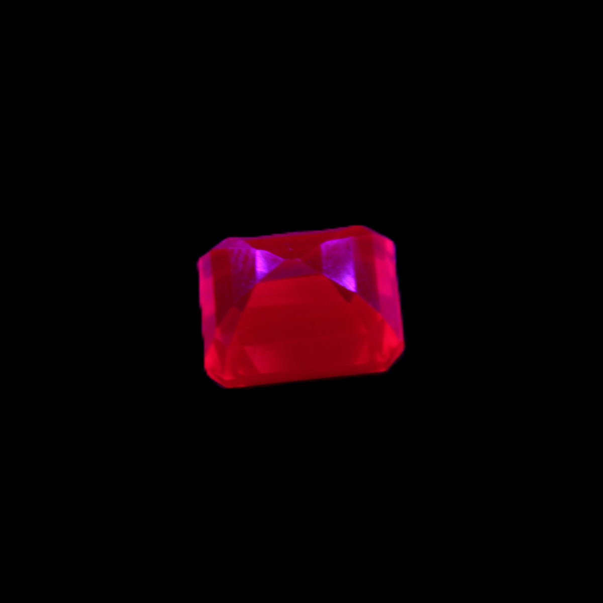 Red Ruby Princess cut from Mozambique 8mm 9ct 2g in UV light - Rocks and Things Store