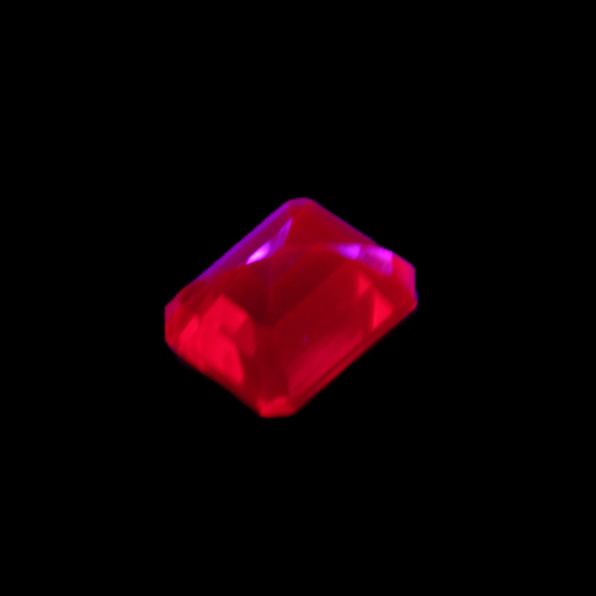 Red Ruby Princess cut from Mozambique 8mm 9ct 2g in UV light - Rocks and Things Store