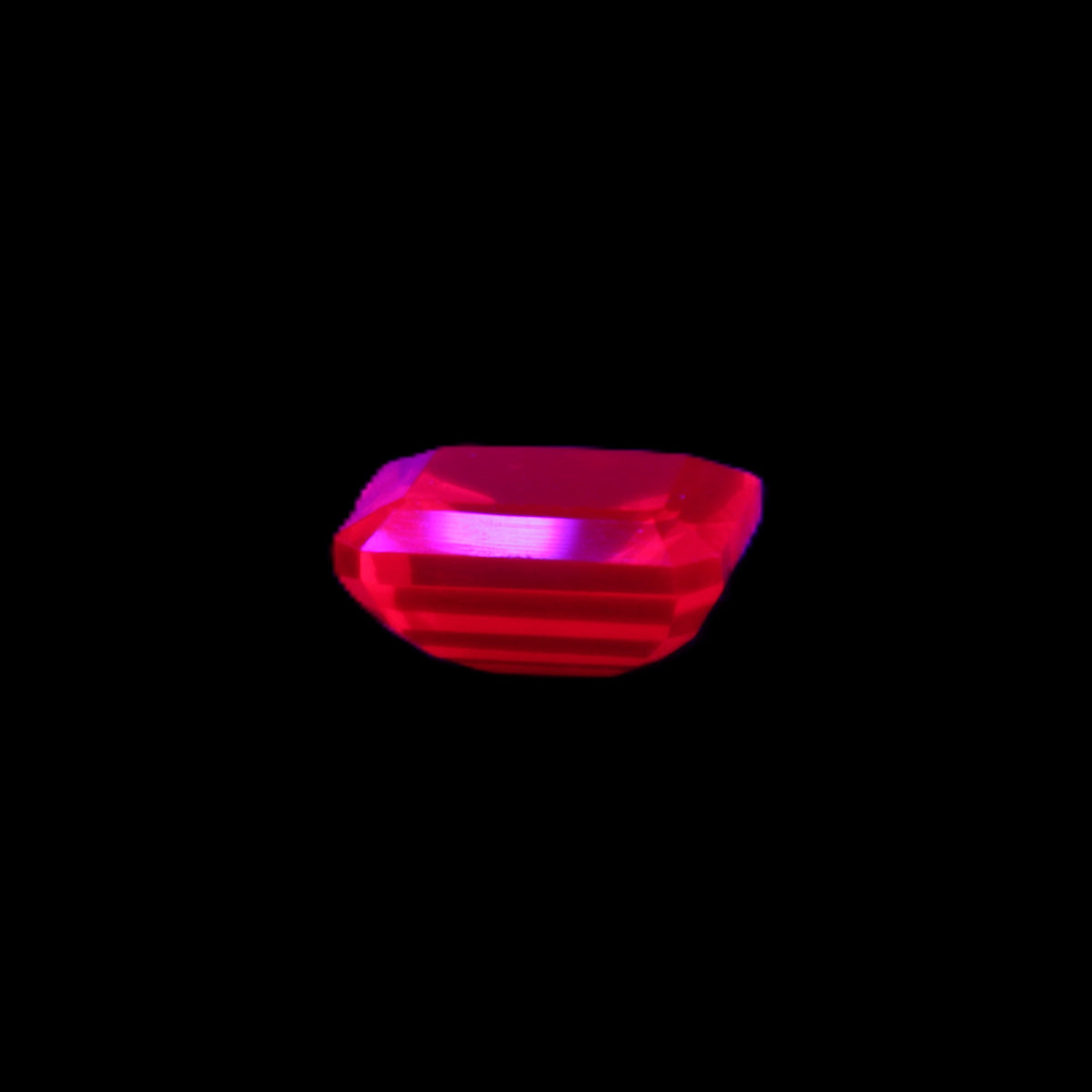 Red Ruby Princess cut from Mozambique 8mm 9ct 2g in UV light - Rocks and Things Store