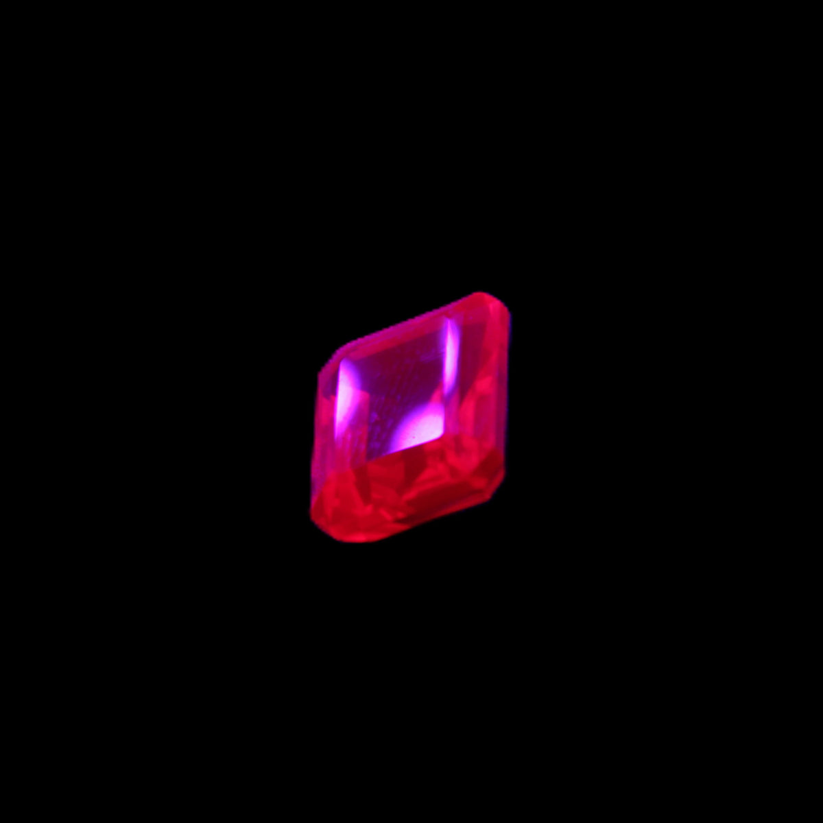 Red Ruby Princess cut from Mozambique 8mm 9ct 2g in UV light - Rocks and Things Store