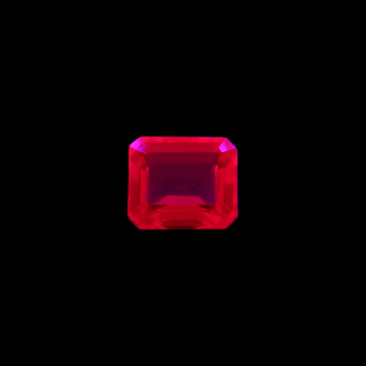 Red Ruby Princess cut from Mozambique 8mm 9ct 2g in UV light - Rocks and Things Store