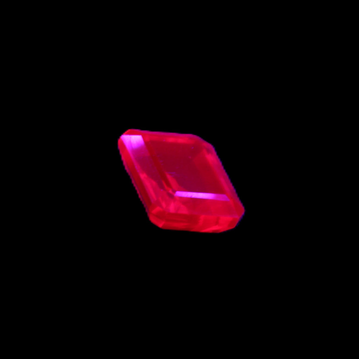 Red Ruby Princess cut from Mozambique 8mm 9ct 2g in UV light - Rocks and Things Store