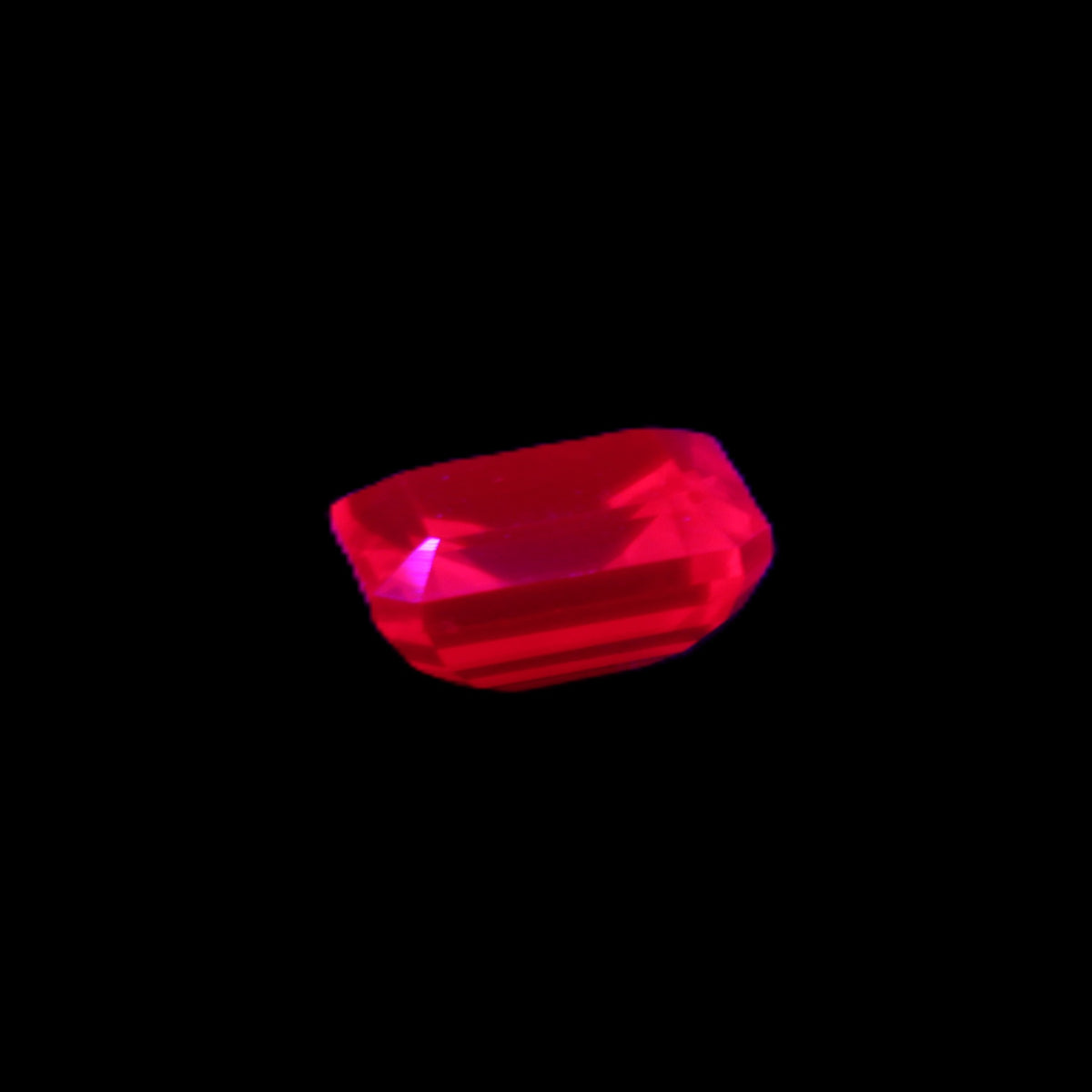 Red Ruby Princess cut from Mozambique 8mm 9ct 2g in UV light - Rocks and Things Store