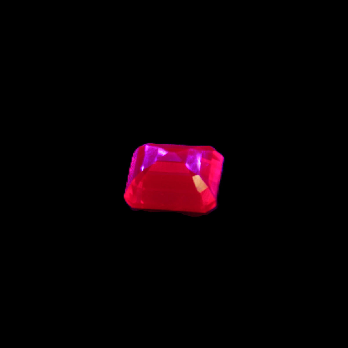 Red Ruby Princess cut from Mozambique 8mm 9ct 2g in UV light - Rocks and Things Store