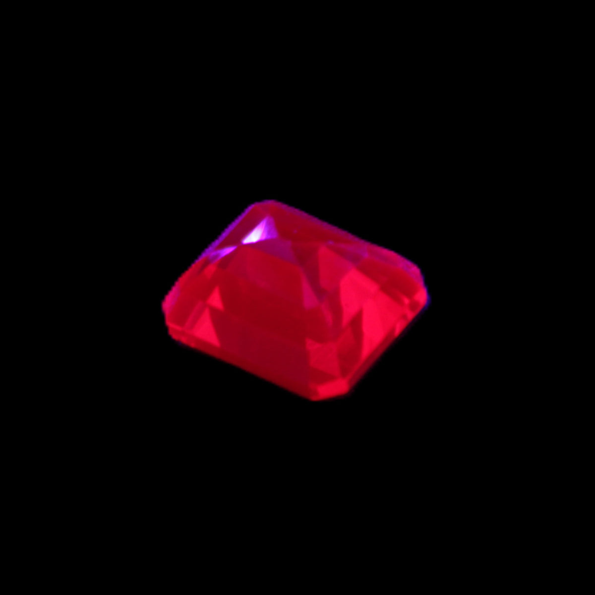 Red Ruby Princess cut from Mozambique 8mm 9ct 2g in UV light - Rocks and Things Store