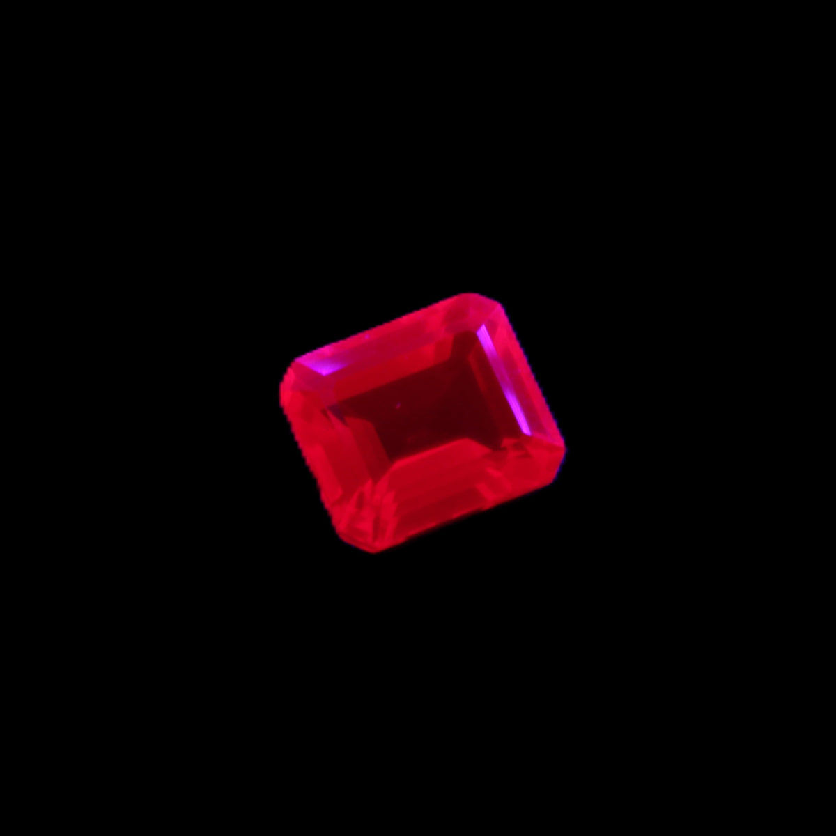 Red Ruby Princess cut from Mozambique 8mm 9ct 2g in UV light - Rocks and Things Store