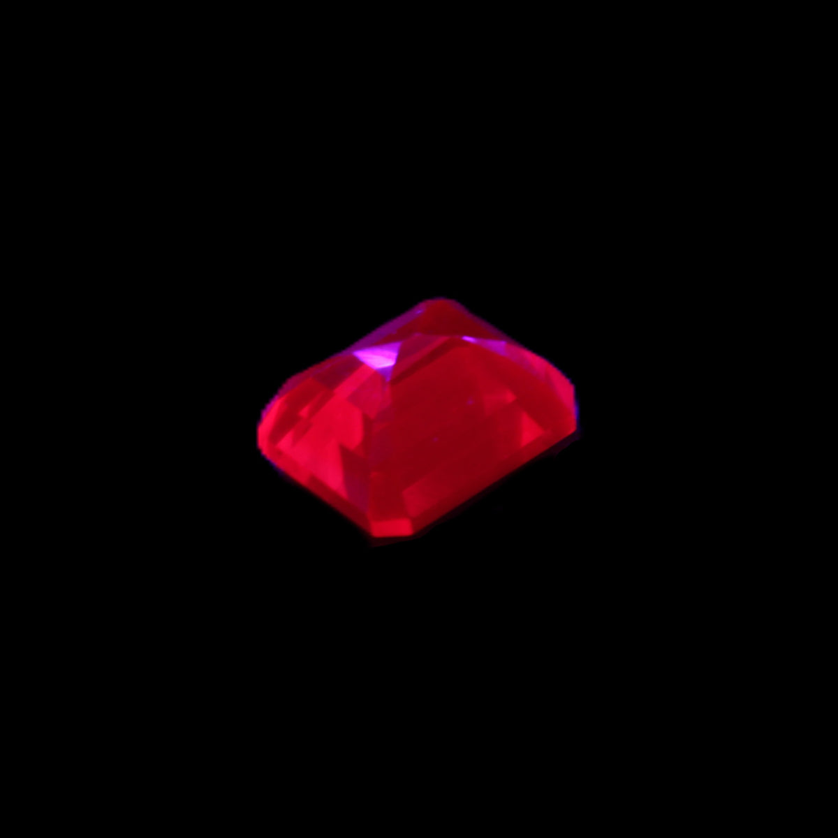 Red Ruby Princess cut from Mozambique 8mm 9ct 2g in UV light - Rocks and Things Store