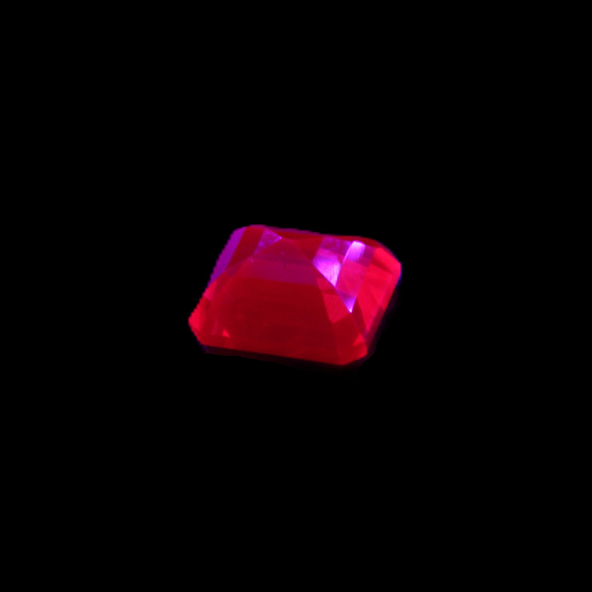 Red Ruby Princess cut from Mozambique 8mm 9ct 2g in UV light - Rocks and Things Store