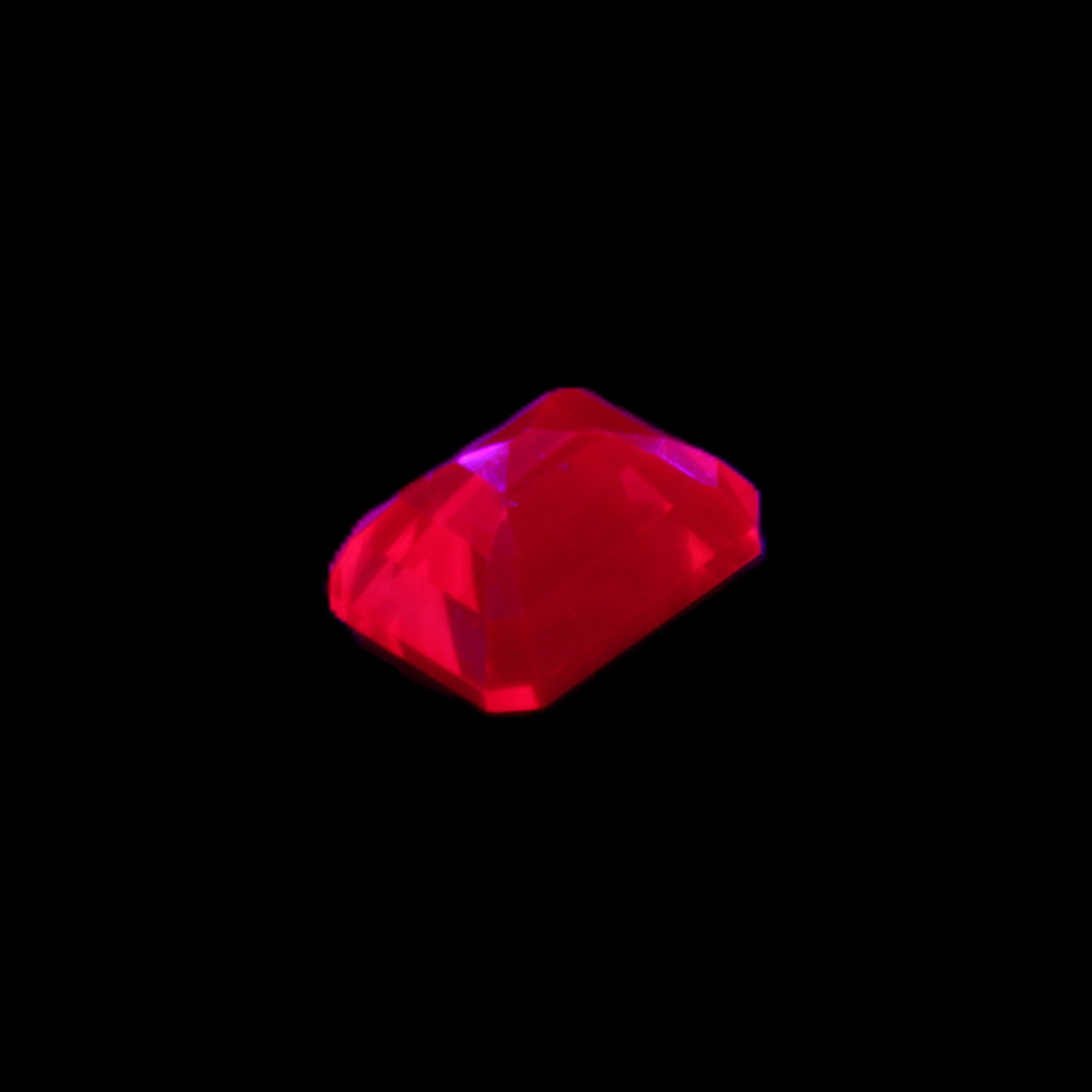 Red Ruby Princess cut from Mozambique 8mm 9ct 2g in UV light - Rocks and Things Store