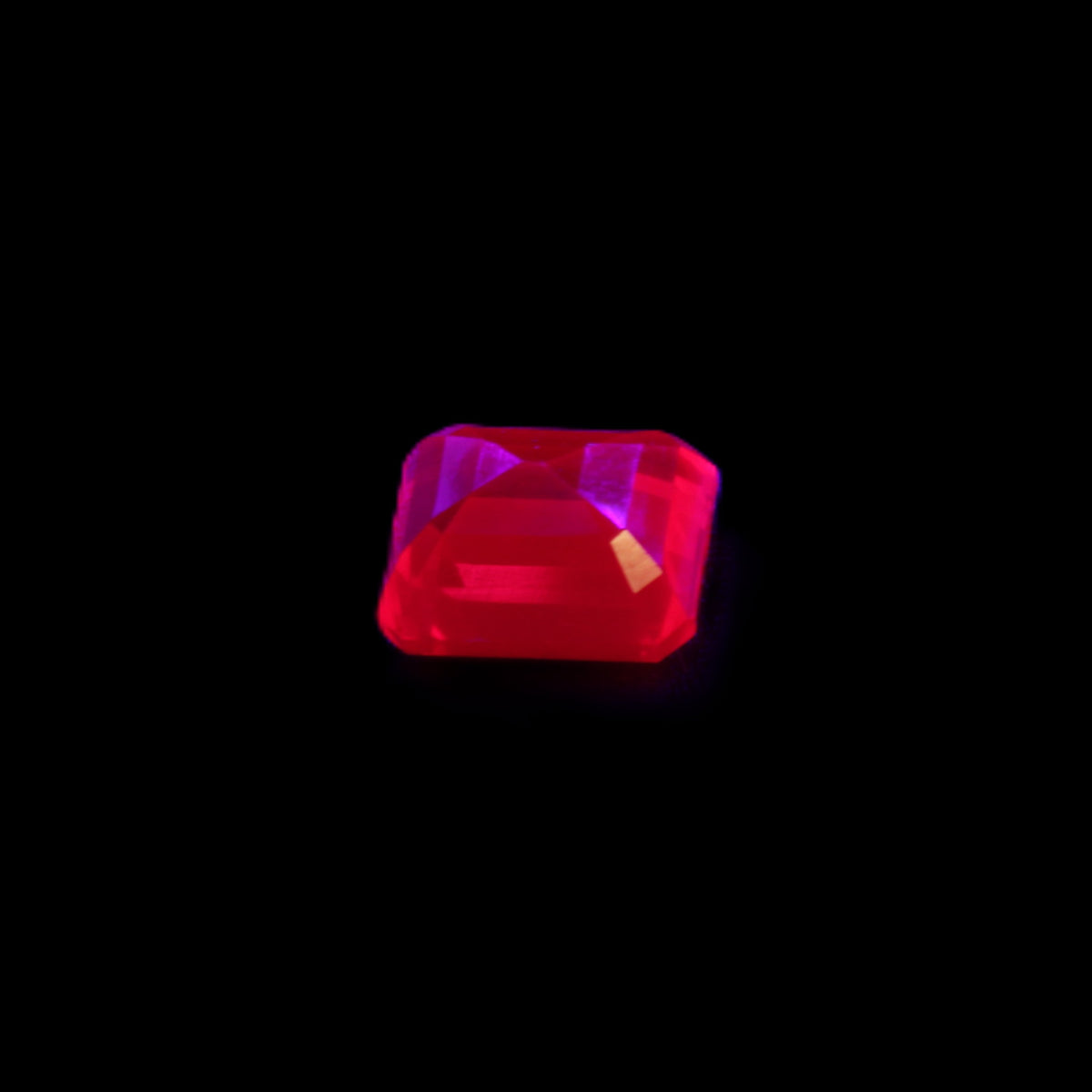 Red Ruby Princess cut from Mozambique 8mm 9ct 2g in UV light - Rocks and Things Store