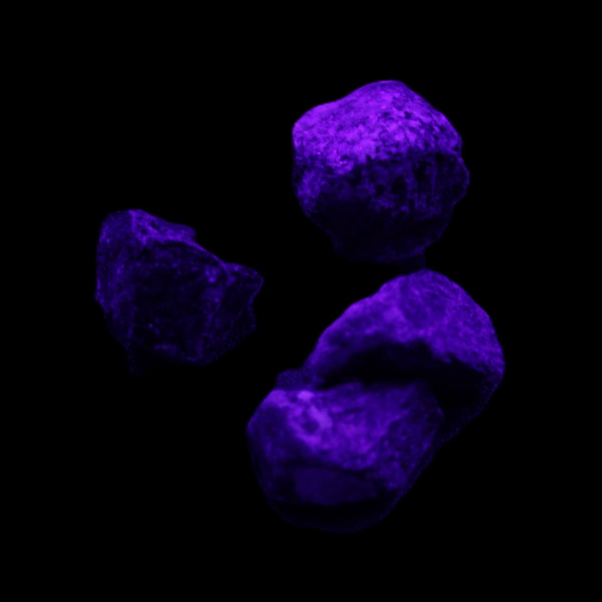 Sapphire corundum 4-6 rough crystals 8-9g in UV light - Rocks and Things Store