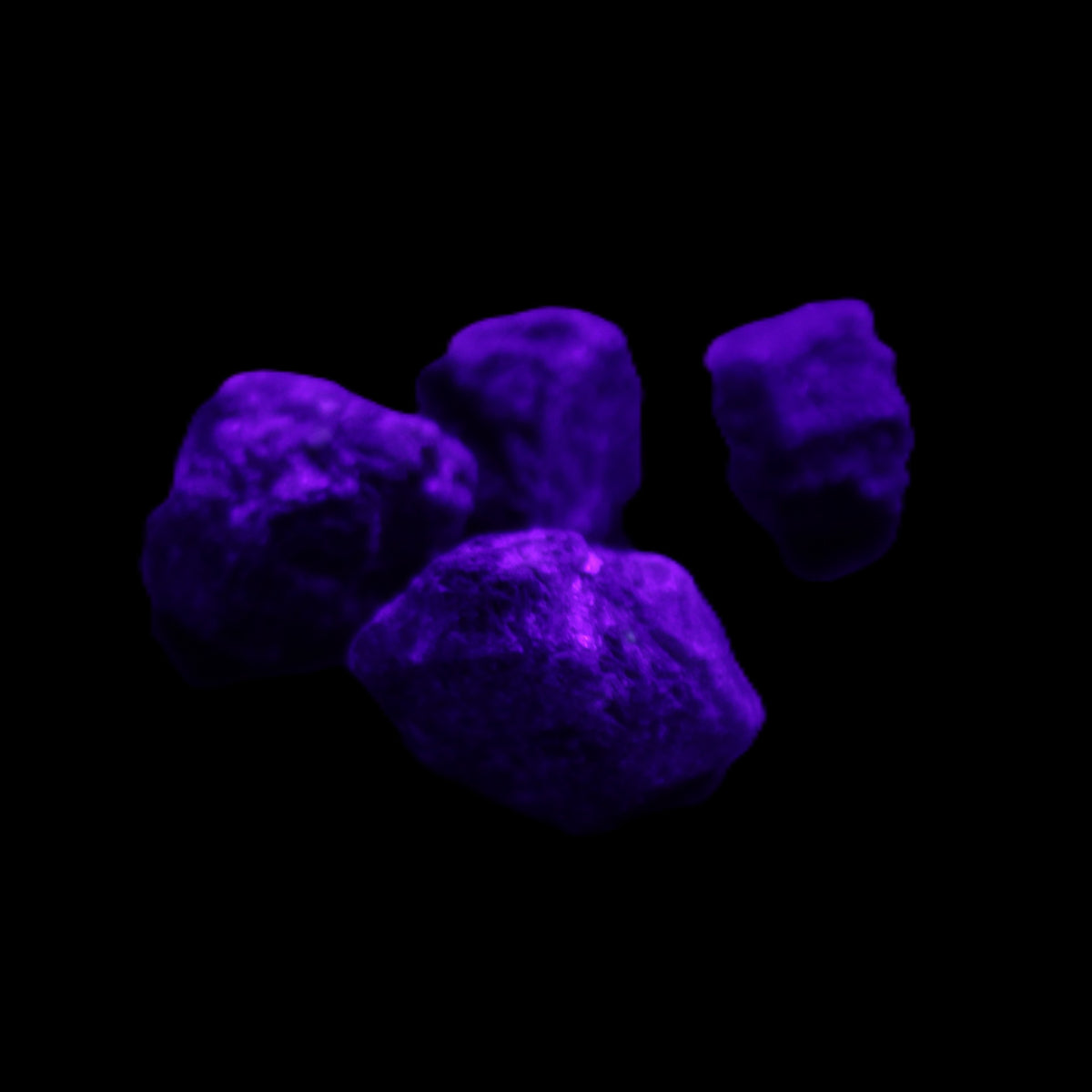 Sapphire corundum 4-6 rough crystals 8-9g in UV light - Rocks and Things Store