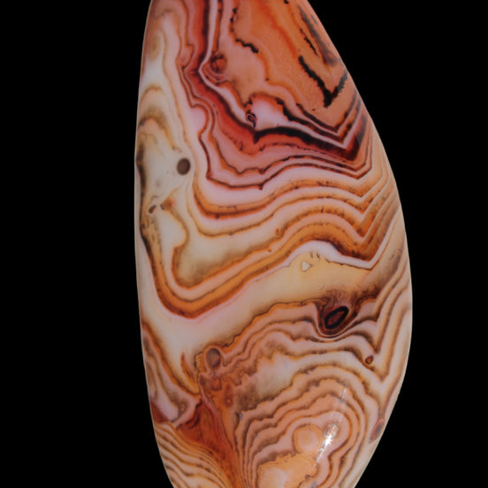 Crazy Lace Silk Banded Agate tumbled stone from Madagascar 59g in sunlight - Rocks and Things Store