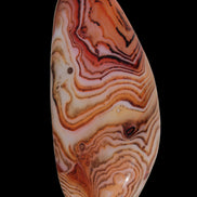 Crazy Lace Silk Banded Agate tumbled stone from Madagascar 59g in sunlight - Rocks and Things Store