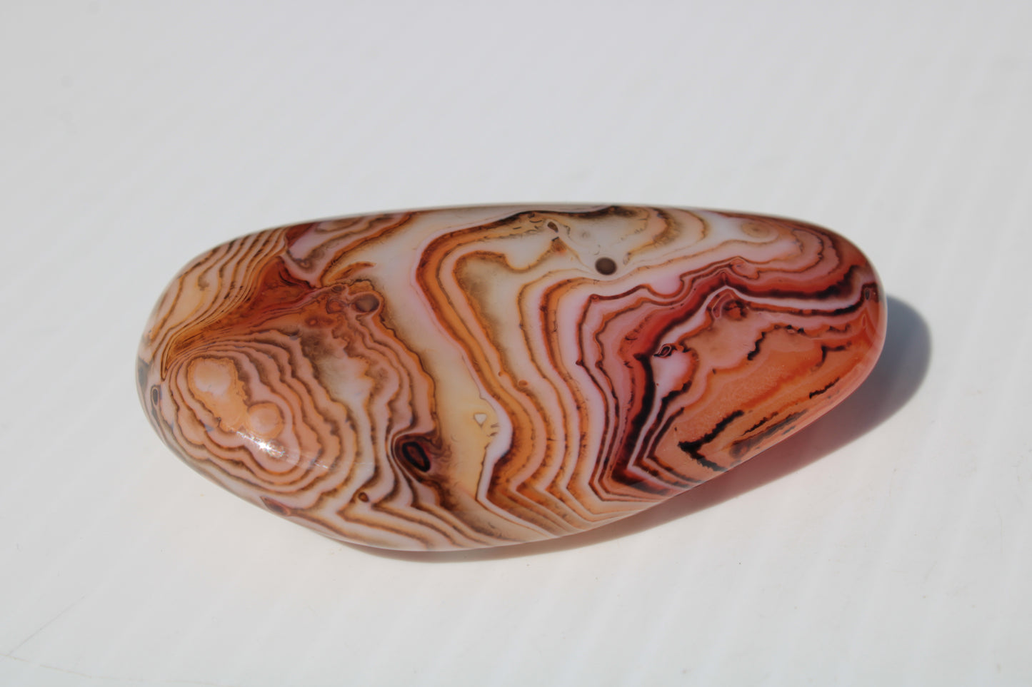 Crazy Lace Silk Banded Agate tumbled stone from Madagascar 59.1g Rocks and Things