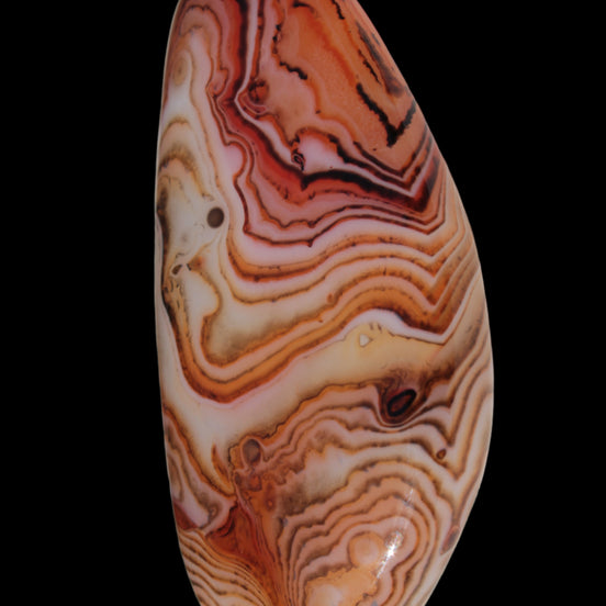 Crazy Lace Silk Banded Agate tumbled stone from Madagascar 59g in sunlight - Rocks and Things Store