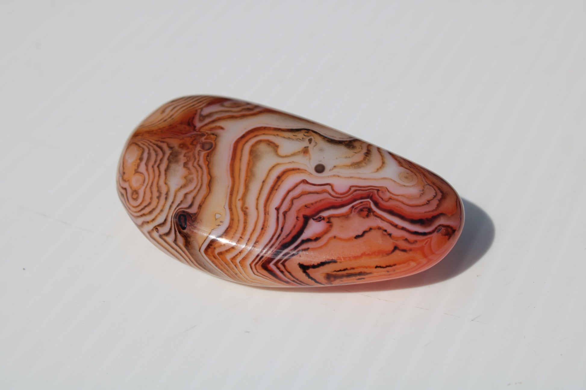 Crazy Lace Silk Banded Agate tumbled stone from Madagascar 59.1g Rocks and Things