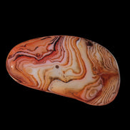 Crazy Lace Silk Banded Agate tumbled stone from Madagascar 59g in sunlight - Rocks and Things Store