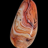 Crazy Lace Silk Banded Agate tumbled stone from Madagascar 59g in sunlight - Rocks and Things Store
