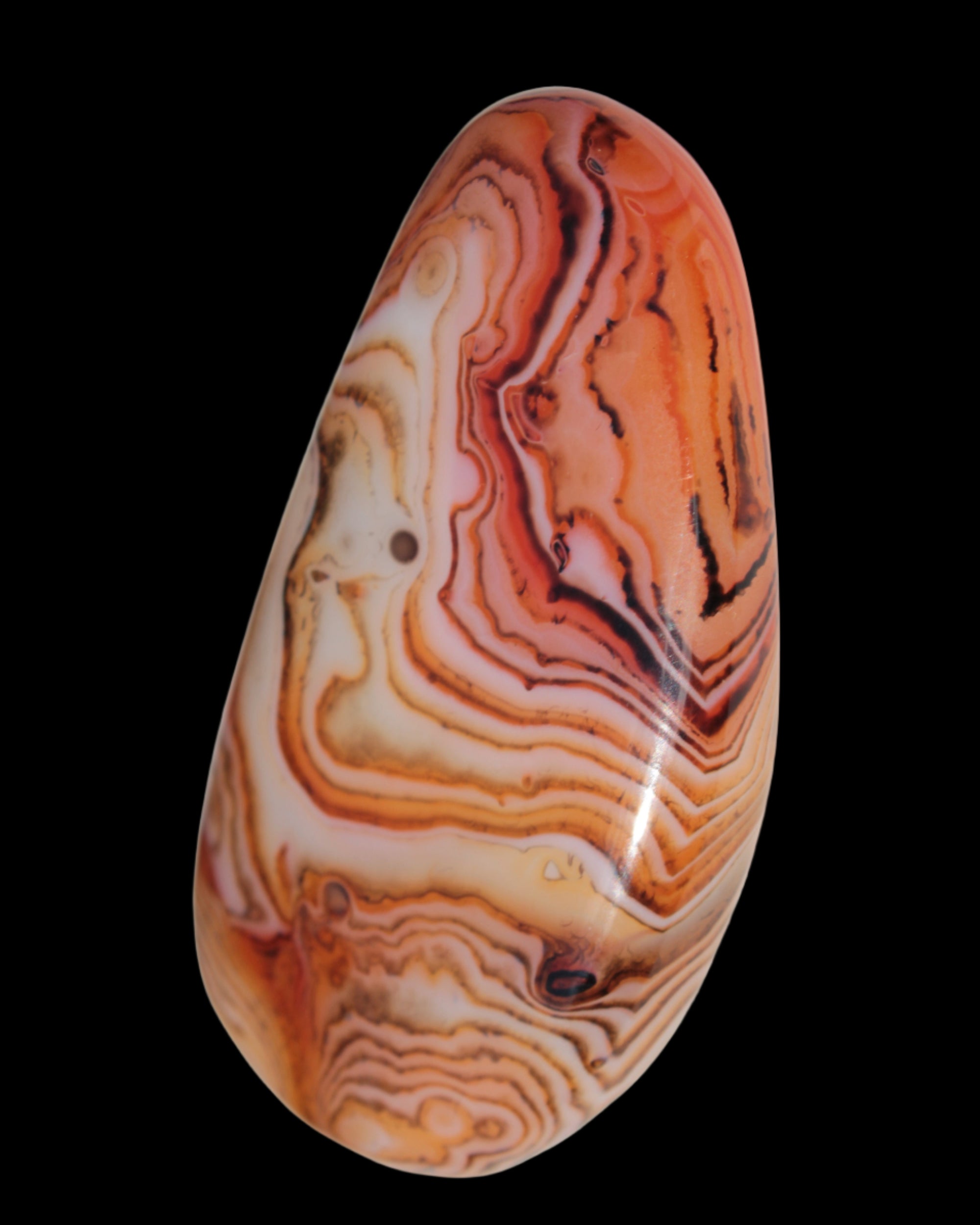 Crazy Lace Silk Banded Agate tumbled stone from Madagascar 59g in sunlight - Rocks and Things Storengs