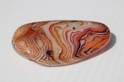 Crazy Lace Silk Banded Agate tumbled stone from Madagascar 59.1g Rocks and Things