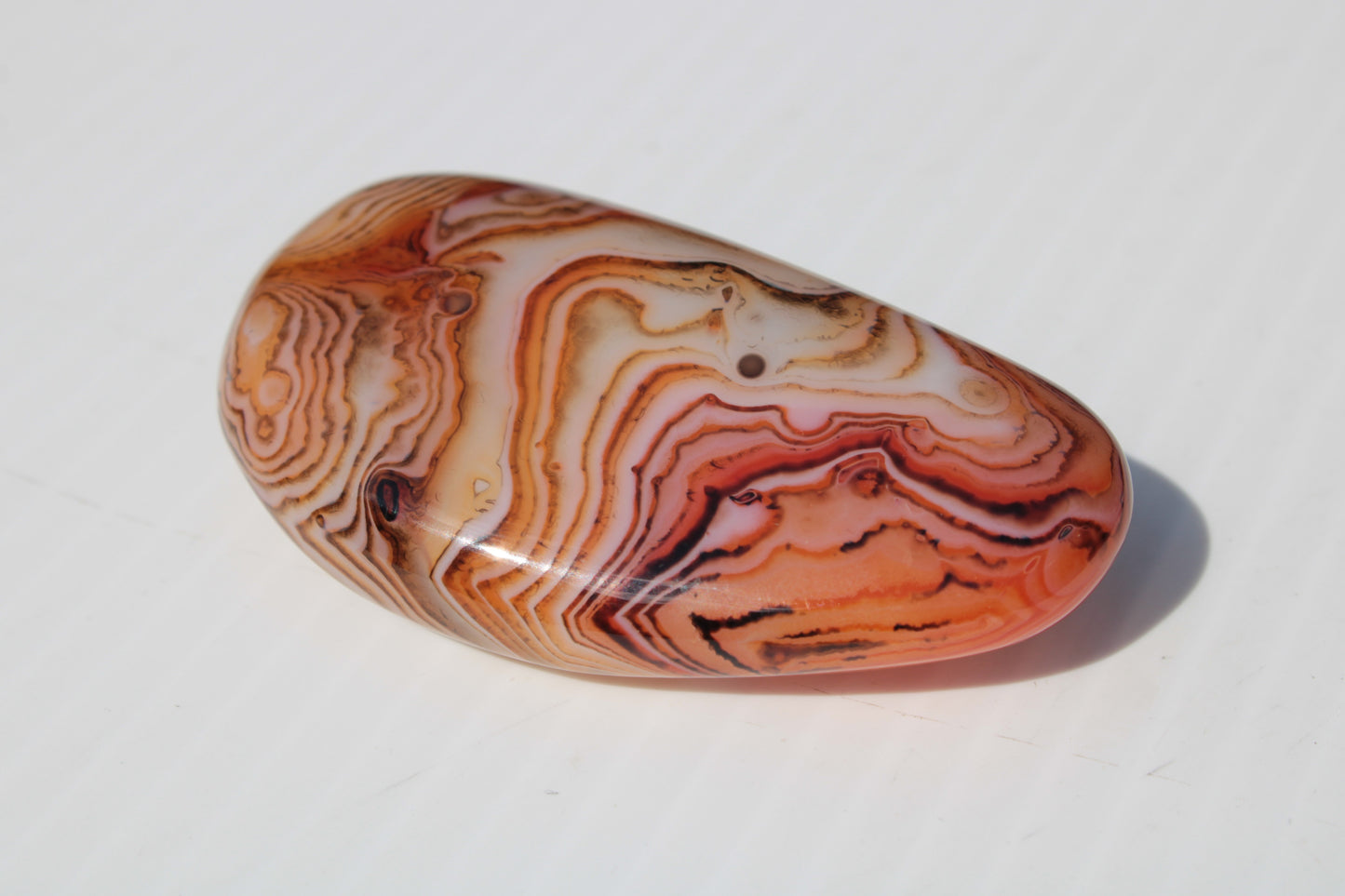 Crazy Lace Silk Banded Agate tumbled stone from Madagascar 59.1g Rocks and Things