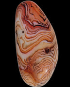 Crazy Lace Silk Banded Agate tumbled stone from Madagascar 59g in sunlight - Rocks and Things Store