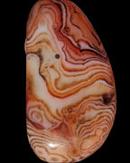 Crazy Lace Silk Banded Agate tumbled stone from Madagascar 59g in sunlight - Rocks and Things Store