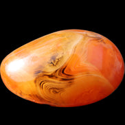 Crazy Lace Silk Banded Agate tumbled stone from Madagascar 63g in sunlight - Rocks and Things Store