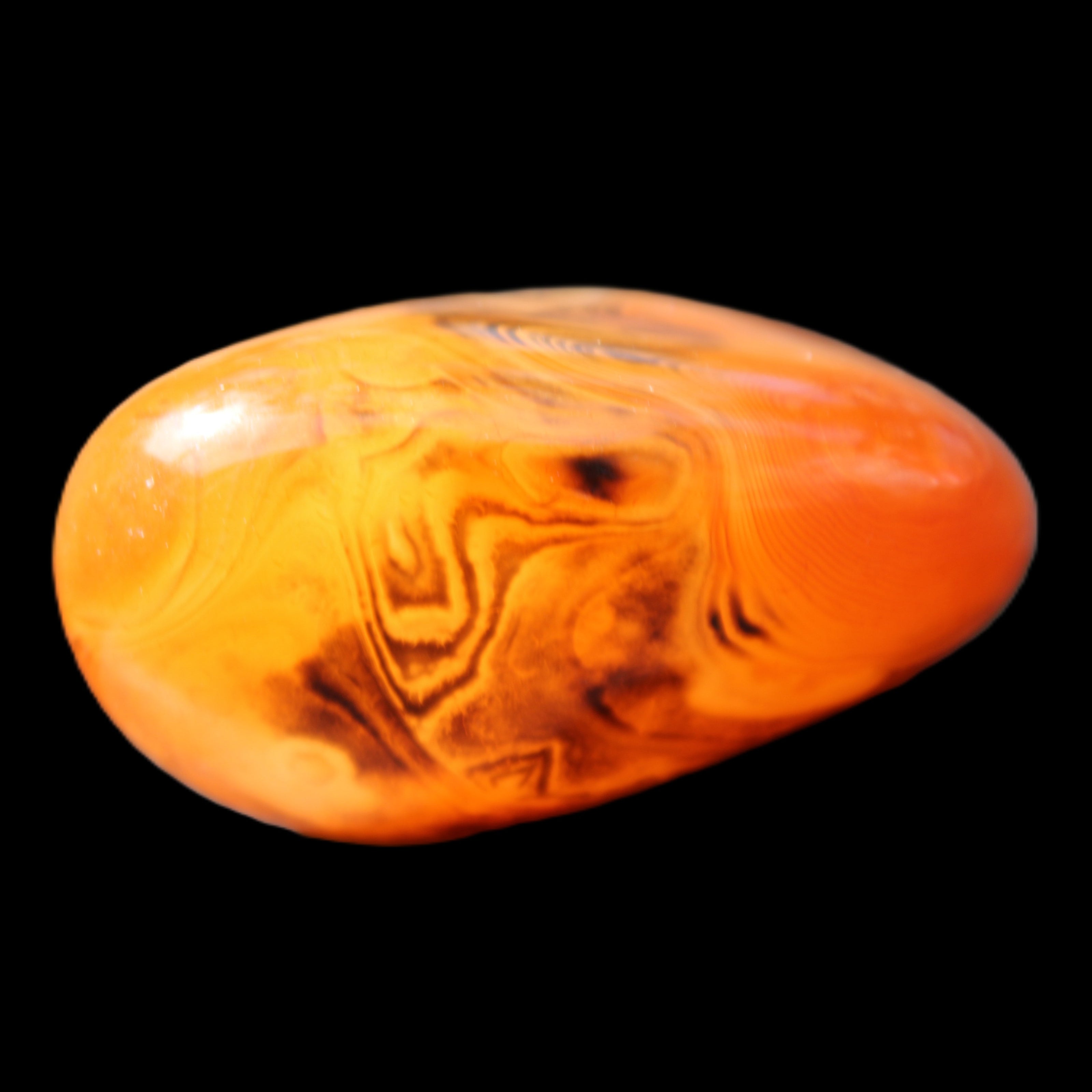 Crazy Lace Silk Banded Agate tumbled stone from Madagascar 63g in sunlight - Rocks and Things Store