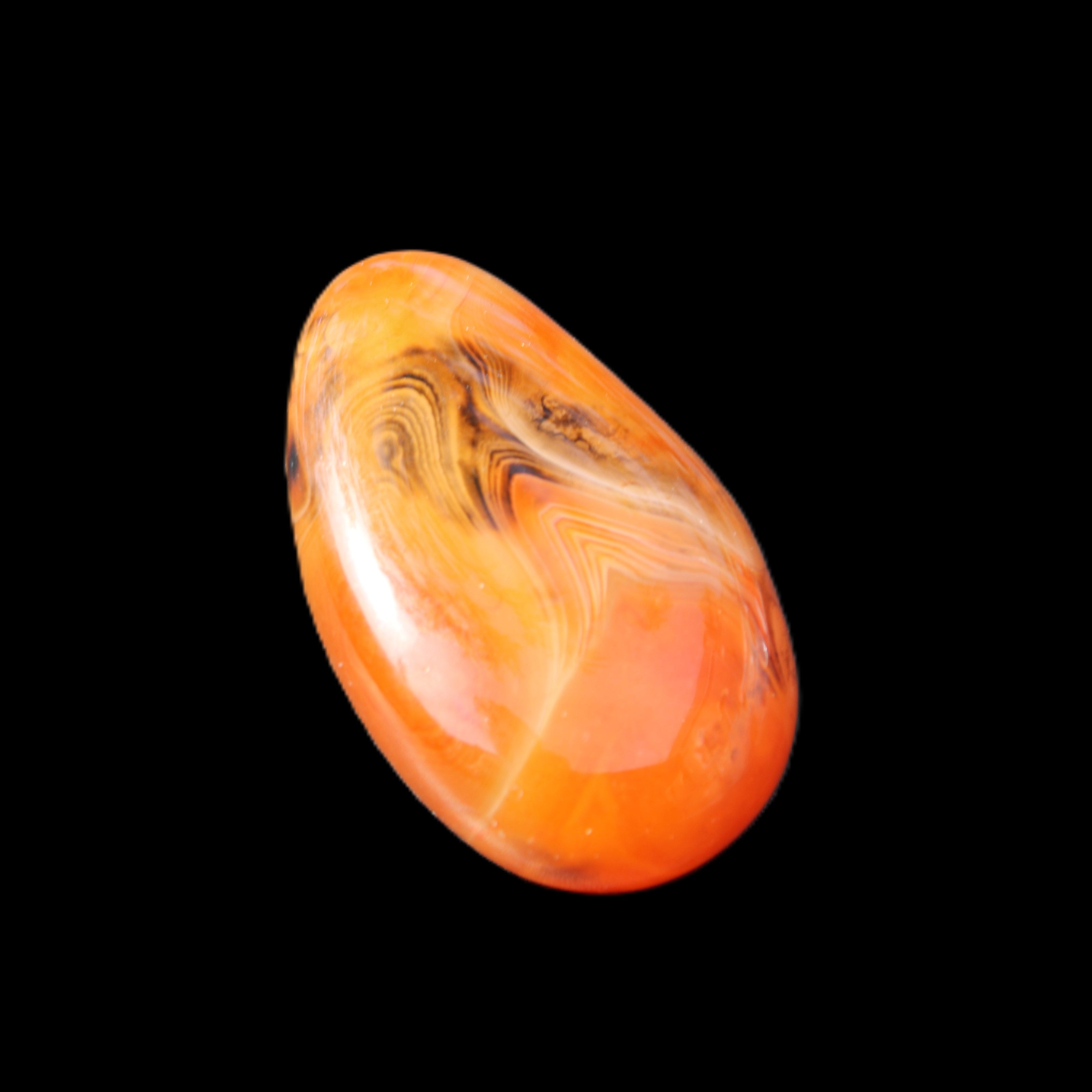 Crazy Lace Silk Banded Agate tumbled stone from Madagascar 63g in sunlight - Rocks and Things Store